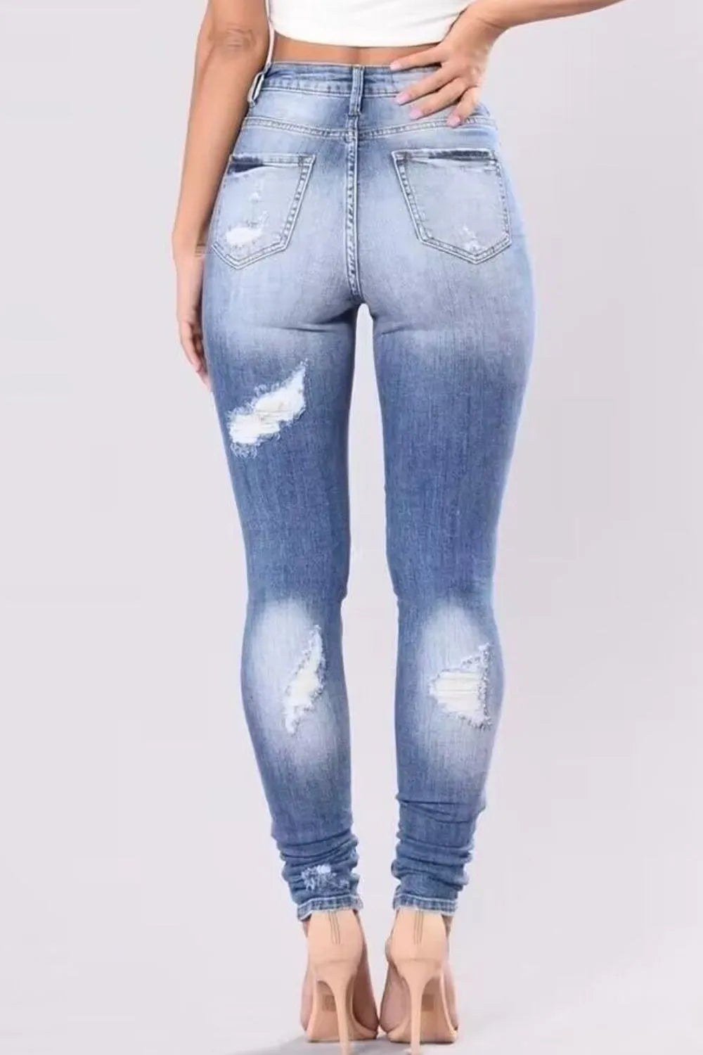 Full Size Distressed Skinny Jeans Plus Size - Women / Jeans & Denim by Trendsi | Available at Handbags Specialist Headquarter