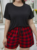 Plus Size Round Neck Tee Shirt and Plaid Shorts Lounge Set - Plus Size Shirts by Trendsi | Available at Handbags Specialist Headquarter