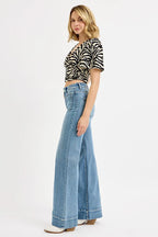 RISEN Full Size High Rise Wide Flare Patch Pocket Jeans Plus Size - Women / Jeans & Denim by Trendsi | Available at Handbags Specialist Headquarter