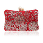 Red clutch with silver floral sequined embroidery and pearl clasp.