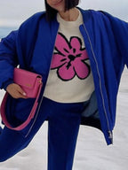 Flower Ribbed Hem Round Neck Sweater - Tops by Trendsi | Available at Handbags Specialist Headquarter