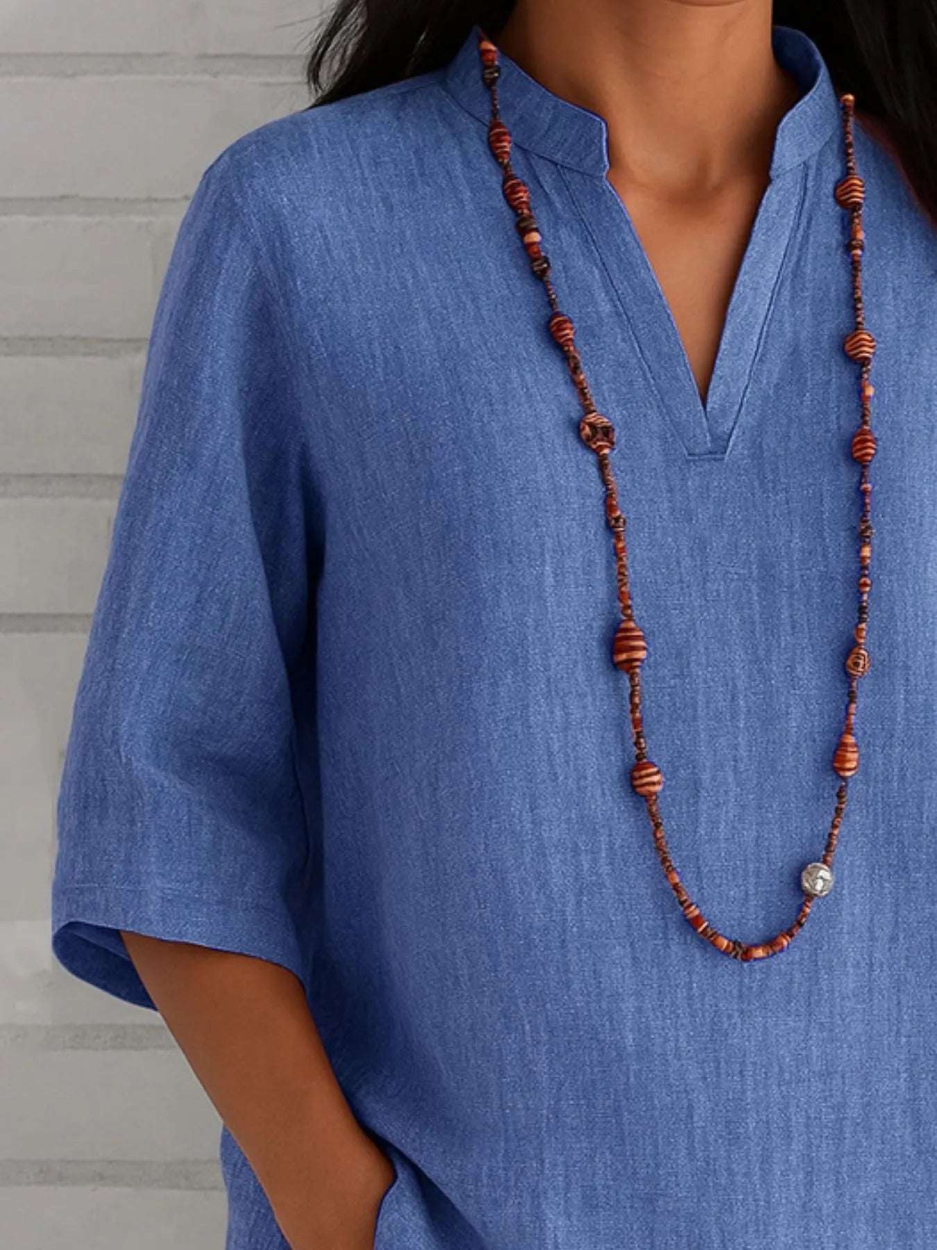 Full Size Notched Three-Quarter Sleeves Blouse Plus Size - Tops by Trendsi | Available at Handbags Specialist Headquarter