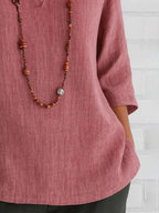 Full Size Notched Three-Quarter Sleeves Blouse Plus Size - Tops by Trendsi | Available at Handbags Specialist Headquarter