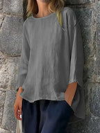 Full Size Round Neck Relaxed Fit Blouse Plus Size - Tops by Trendsi | Available at Handbags Specialist Headquarter