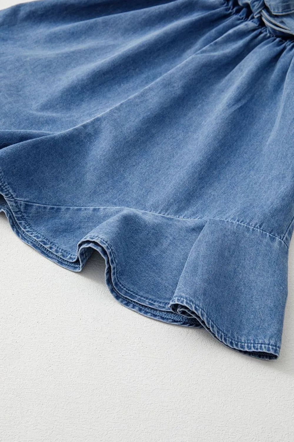 Spaghetti Straps V Neck Belted Ruffled Leg Chambray Romper - Women / Jeans & Denim by Trendsi | Available at Handbags Specialist Headquarter