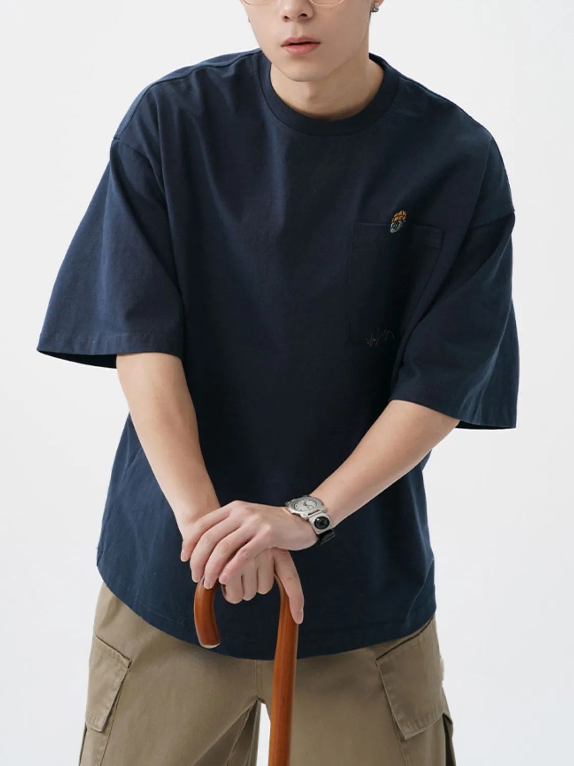 Men's Plus Size Round Neck Embroidered T-Shirt - Men's T-Shirt by Trendsi | Available at Handbags Specialist Headquarter