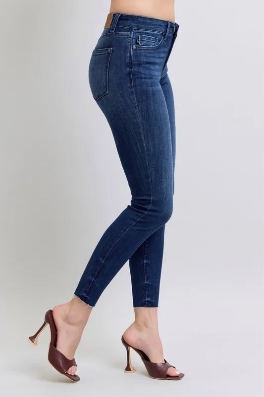 Judy Blue Full Size Mid Rise Skinny Jeans with Raw Hem Plus Size - Women / Jeans & Denim by Trendsi | Available at Handbags Specialist Headquarter