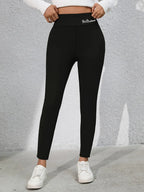Full Size Letter Embroidered High Waist Leggings - Leggings by Trendsi | Available at Handbags Specialist Headquarter