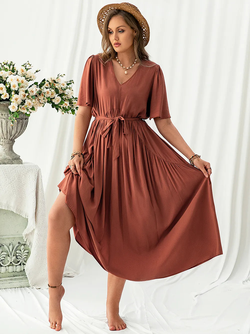 Plus Size V-Neck Flutter Sleeve Midi Dress - Dresses by Trendsi | Available at Handbags Specialist Headquarter