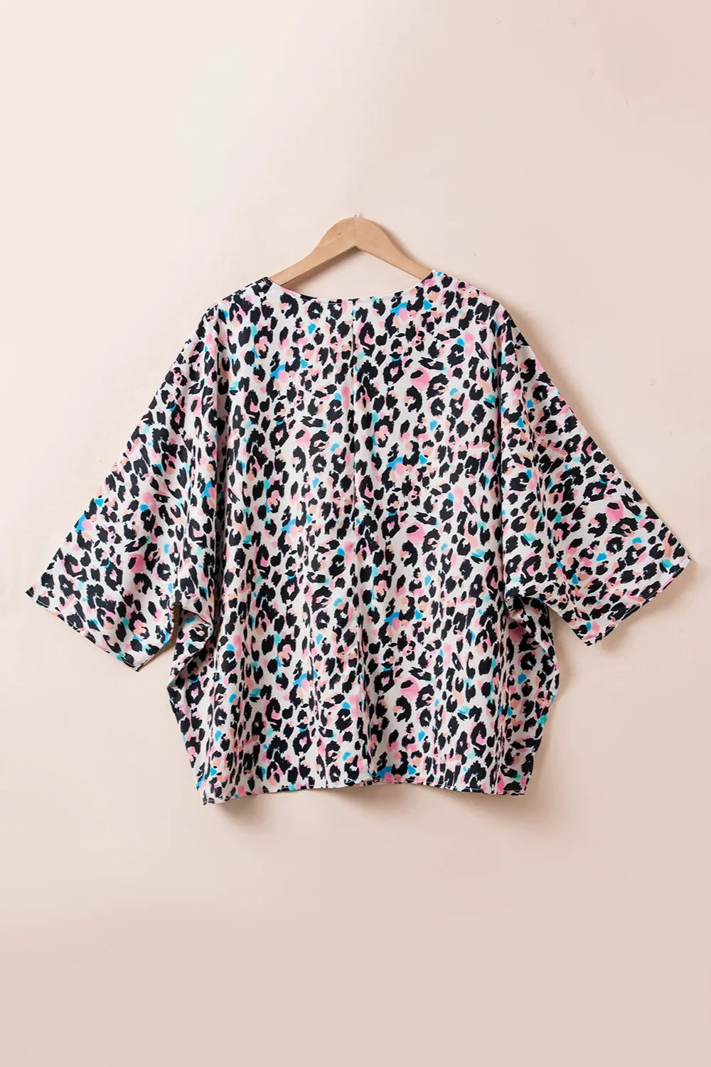 Plus Size Leopard V-Neck Three-Quarter Sleeve Blouse - Plus Size Shirts by Trendsi | Available at Handbags Specialist Headquarter