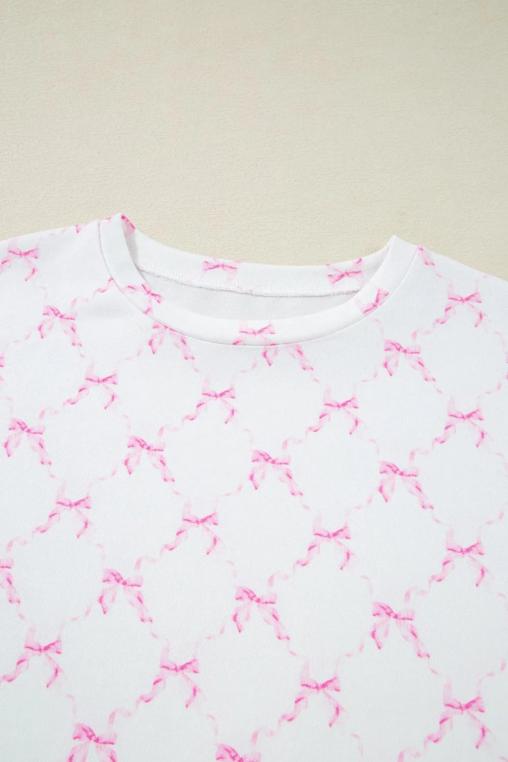 Bow Print Lettuce Trim Round Neck Top and Shorts Lounge Set - Sleepwear by Trendsi | Available at Handbags Specialist Headquarter