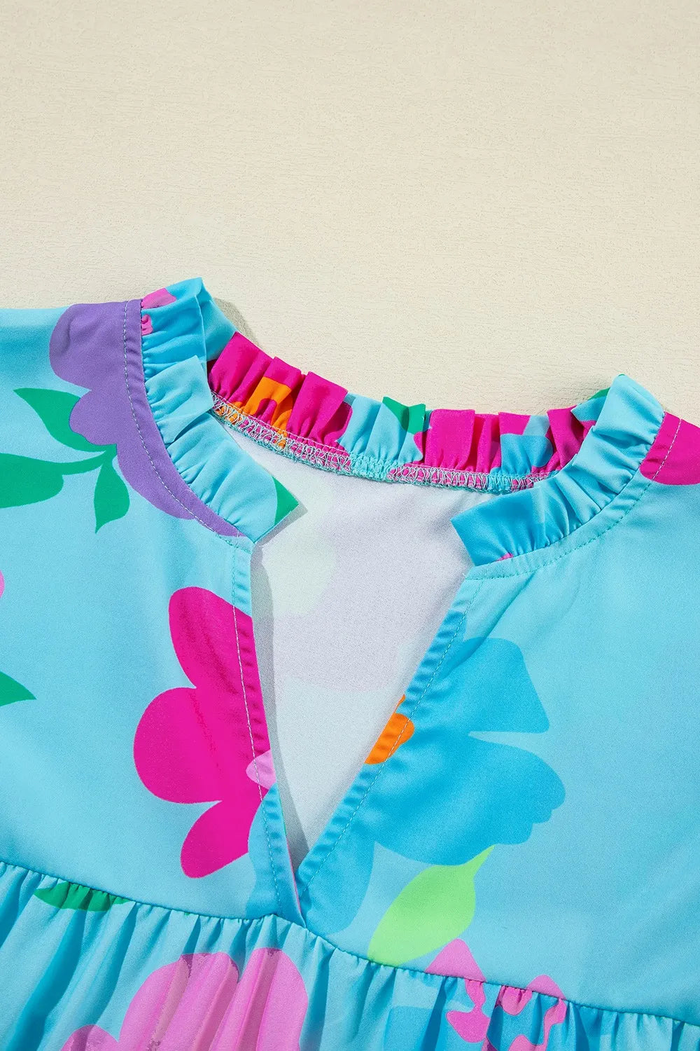 Plus Size Peplum Printed Notched Blouse - Plus Size Shirts by Trendsi | Available at Handbags Specialist Headquarter