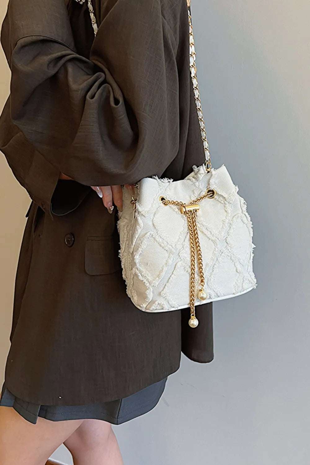 Chain Drawstring Raw Edge Denim Bucket Bag - Crossbody Bag by Trendsi | Available at Handbags Specialist Headquarter