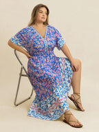 Plus Size Smocked Printed Half Sleeve Midi Dress - Dresses by Trendsi | Available at Handbags Specialist Headquarter