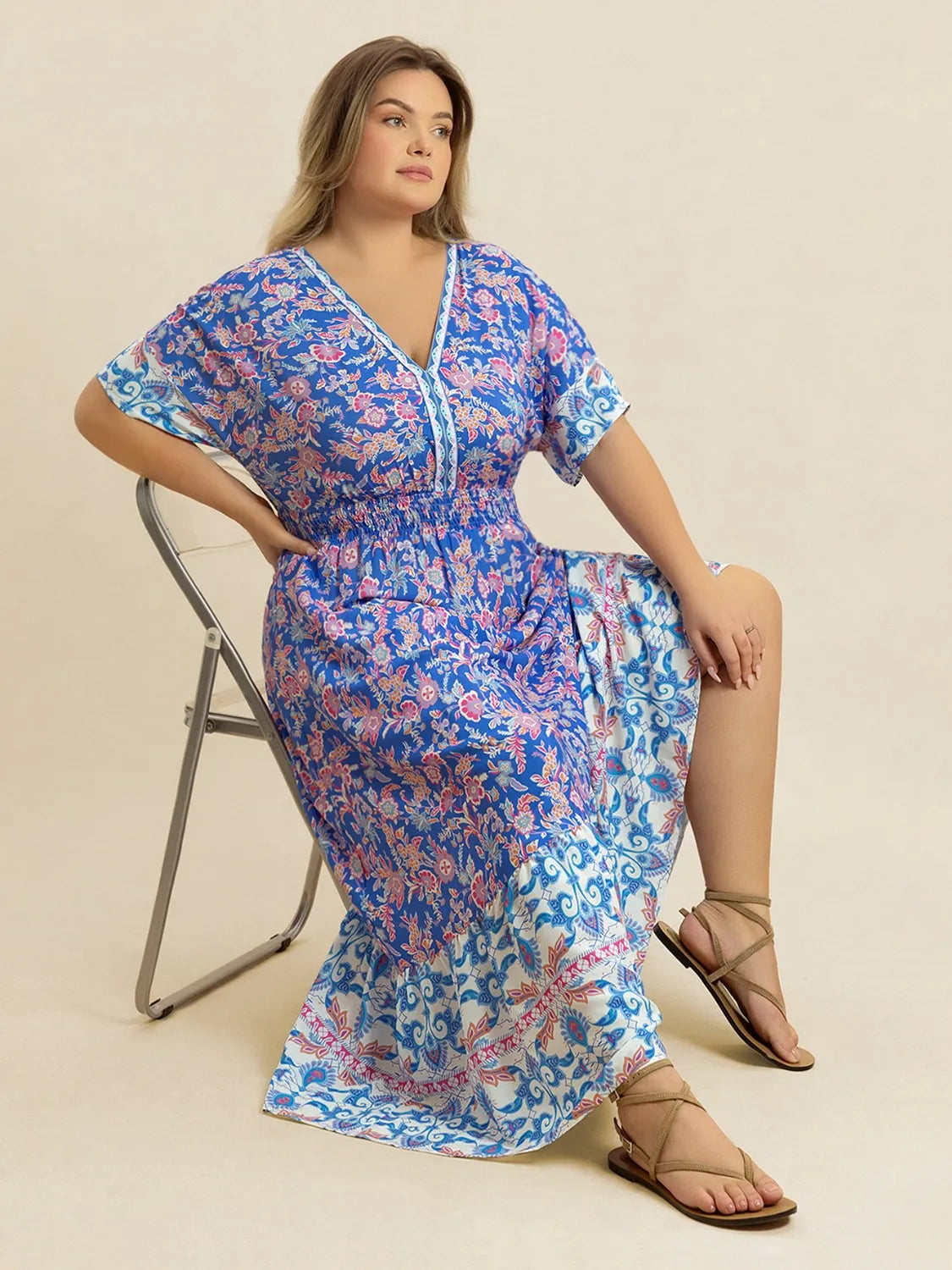 Plus Size Smocked Printed Half Sleeve Midi Dress - Dresses by Trendsi | Available at Handbags Specialist Headquarter