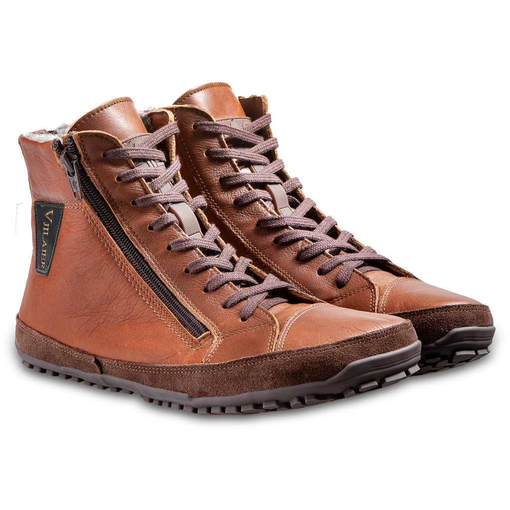 Brown leather high-top sneakers with dark laces, side zippers, and textured rubber soles.