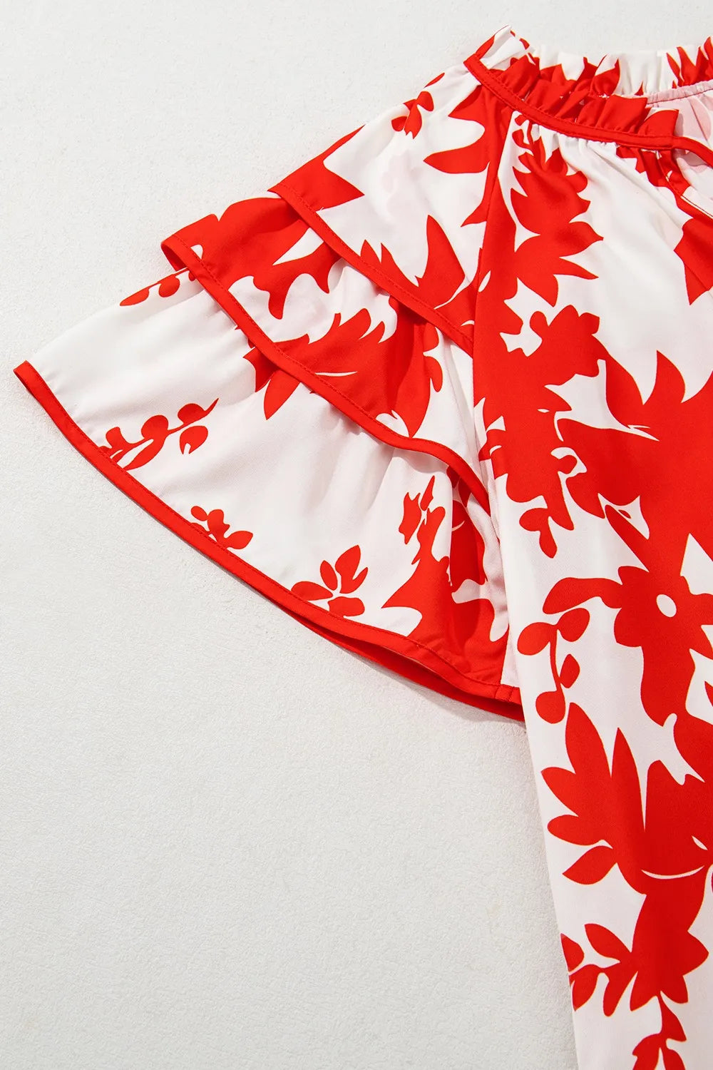 Plant Print Tiered Ruffled Sleeve Tie Neck Blouse - Tops by Trendsi | Available at Handbags Specialist Headquarter