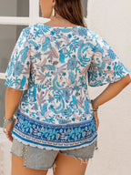 Plus Size Printed V-Neck Half Sleeve Blouse - Plus Size Shirts by Trendsi | Available at Handbags Specialist Headquarter