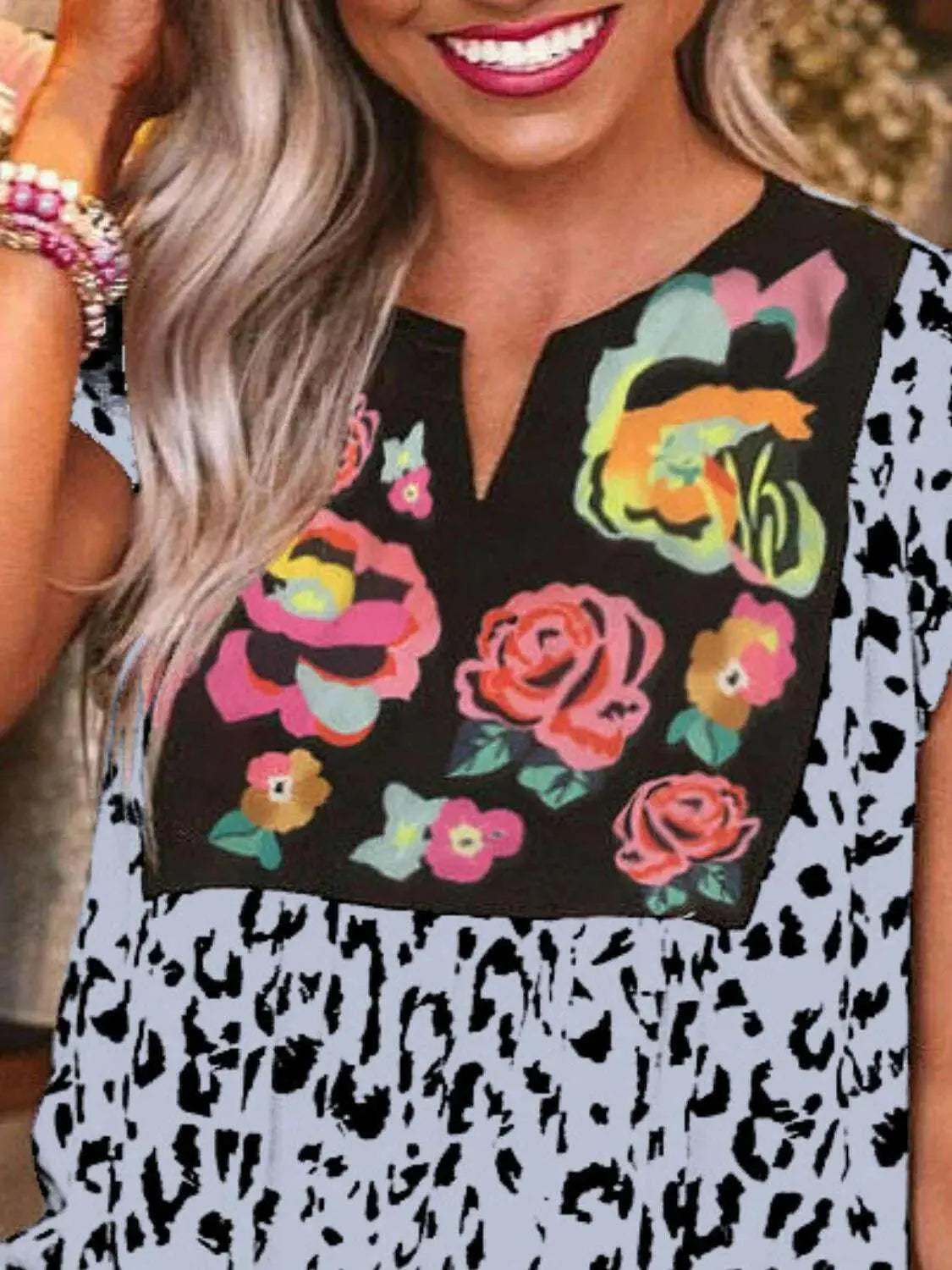 Full Size Leopard Floral Notched Cap Sleeve Blouse Plus Size - Women Plus Size by Trendsi | Available at Handbags Specialist Headquarter