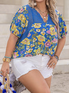 Plus Size Printed Notched Short Sleeve Blouse - Plus Size Shirts by Trendsi | Available at Handbags Specialist Headquarter