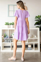 Heimish Full Size Swiss Dot Short Sleeve Tiered Dress - Dresses by Trendsi | Available at Handbags Specialist Headquarter